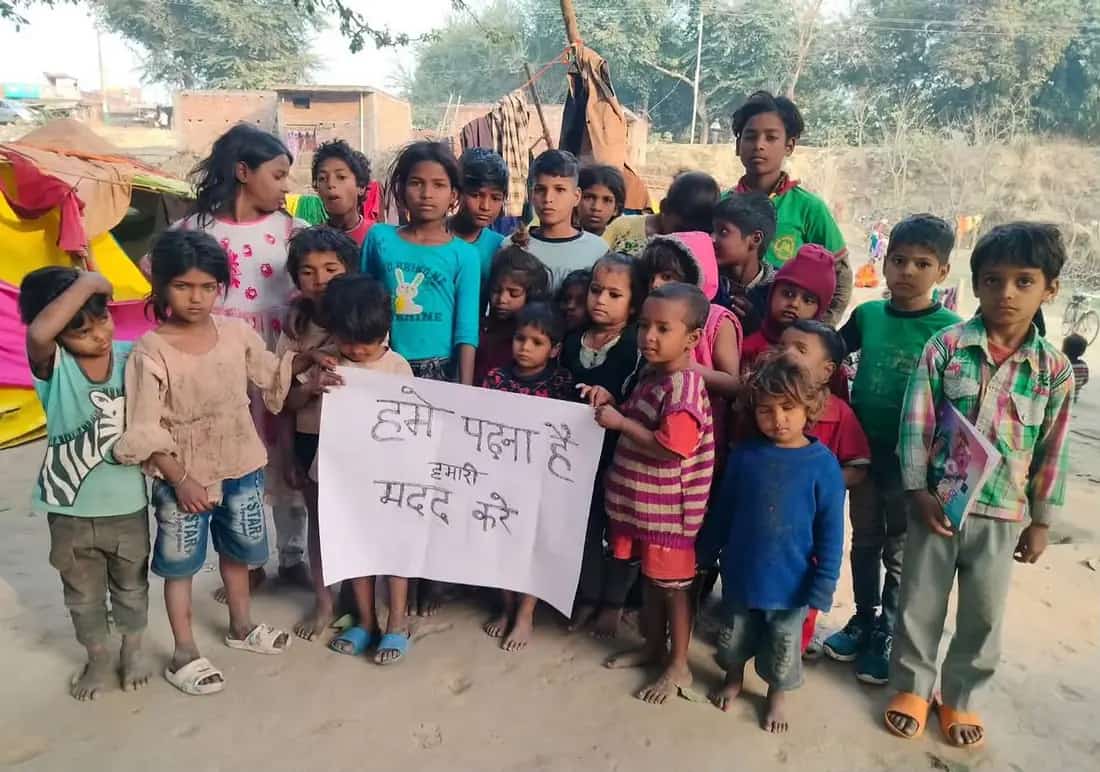 Children receiving education support and learning materials