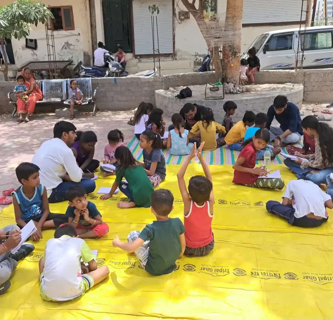 Students gathered during a community education activity