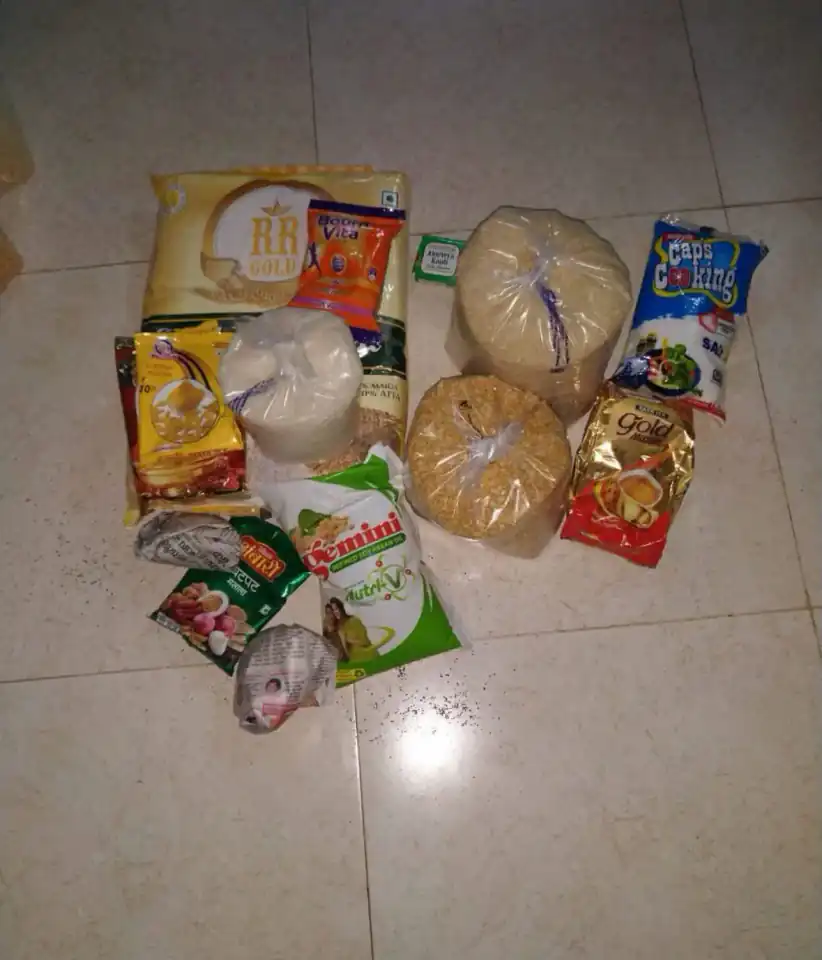 Rice, pulses and household food essentials prepared as a support kit